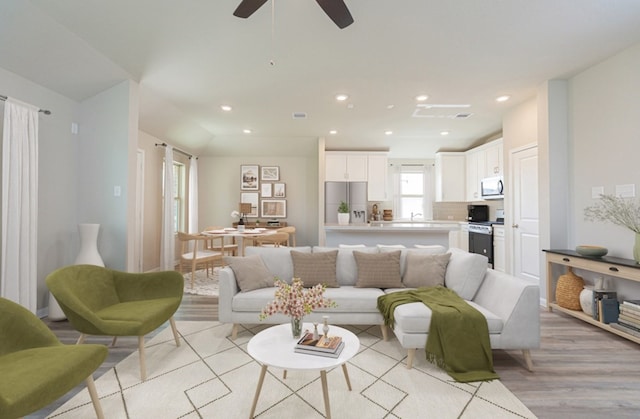 3217 21st St N, Texas City, TX 77590 - living area with light wood-type flooring, recessed lighting, and a ceiling fan