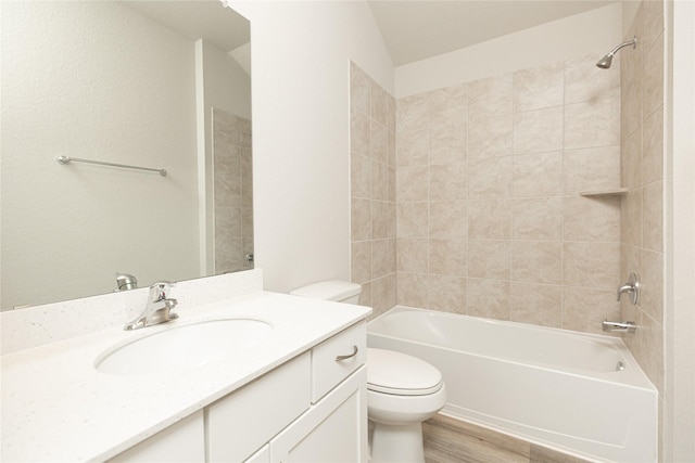 3217 21st St N, Texas City, TX 77590 - full bath featuring toilet, shower / tub combination, vanity, and wood finished floors