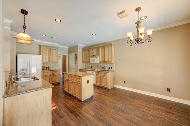 7610 Cedar Jump Dr, Humble, TX 77346 - kitchen featuring white appliances, a sink, tasteful backsplash, light brown cabinets, and crown molding