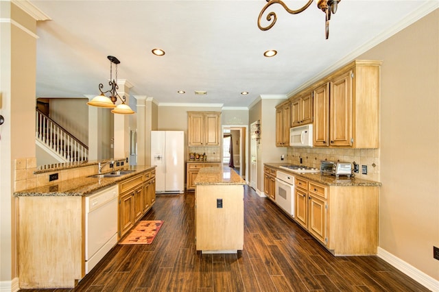 7610 Cedar Jump Dr, Humble, TX 77346 - kitchen with white appliances, a kitchen island, backsplash, a sink, and recessed lighting