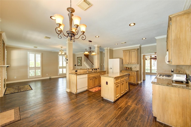 7610 Cedar Jump Dr, Humble, TX 77346 - kitchen with white appliances, crown molding, light stone countertops, tasteful backsplash, and dark wood-type flooring