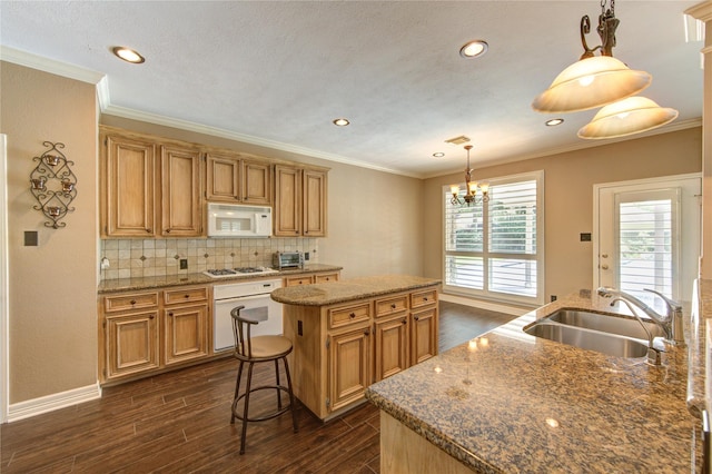 7610 Cedar Jump Dr, Humble, TX 77346 - kitchen with white appliances, a center island, a sink, dark wood-type flooring, and backsplash