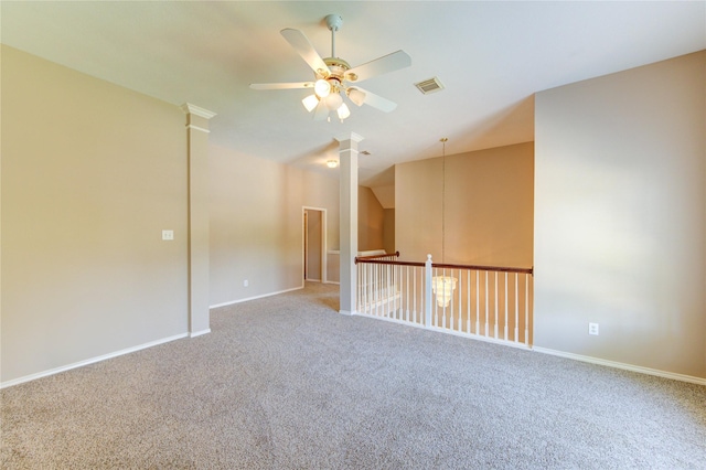 7610 Cedar Jump Dr, Humble, TX 77346 - carpeted spare room featuring a ceiling fan, decorative columns, baseboards, and vaulted ceiling