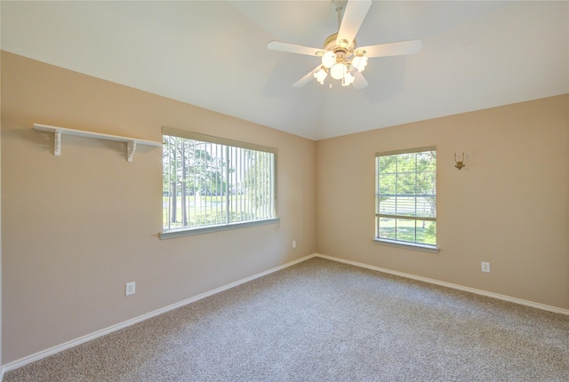 7610 Cedar Jump Dr, Humble, TX 77346 - carpeted spare room with lofted ceiling, baseboards, and a ceiling fan