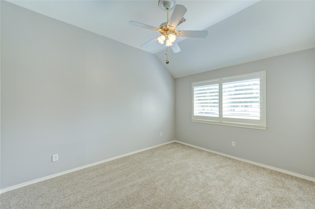 7610 Cedar Jump Dr, Humble, TX 77346 - empty room with vaulted ceiling, carpet, ceiling fan, and baseboards