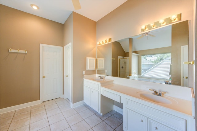 7610 Cedar Jump Dr, Humble, TX 77346 - bathroom with ceiling fan, a stall shower, tile patterned floors, double vanity, and baseboards
