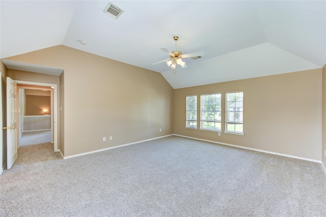 7610 Cedar Jump Dr, Humble, TX 77346 - empty room featuring carpet, vaulted ceiling, a ceiling fan, and baseboards