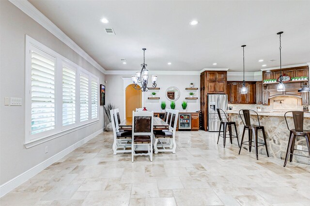 32811 Warbler Ct, Fulshear, TX 77441 - dining room with recessed lighting, a chandelier, baseboards, and crown molding