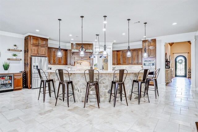 32811 Warbler Ct, Fulshear, TX 77441 - kitchen with stainless steel appliances, beverage cooler, brown cabinets, decorative backsplash, and recessed lighting