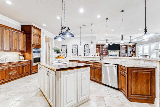 32811 Warbler Ct, Fulshear, TX 77441 - kitchen with stainless steel appliances, a large island, a sink, recessed lighting, and decorative backsplash