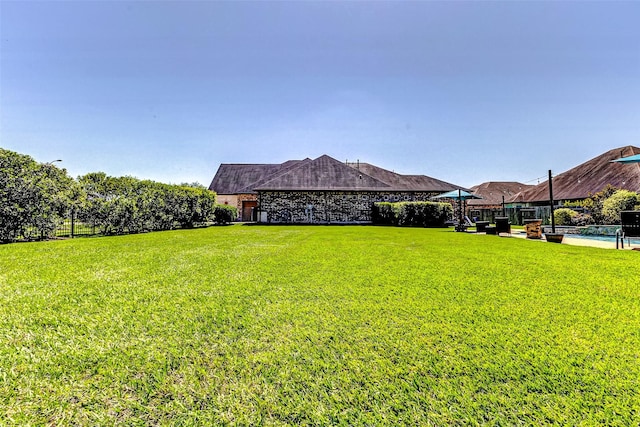 32811 Warbler Ct, Fulshear, TX 77441 - view of yard with an outdoor pool
