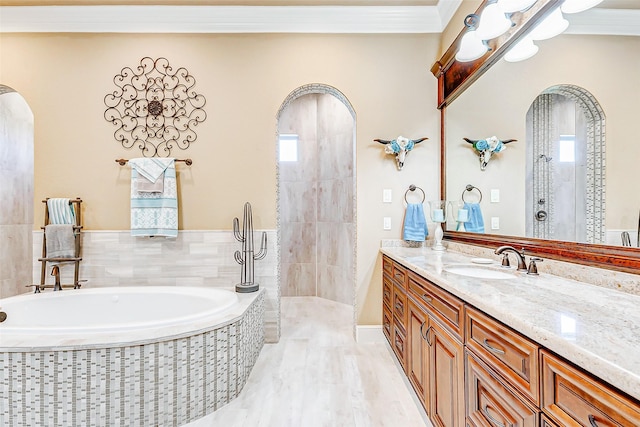 32811 Warbler Ct, Fulshear, TX 77441 - full bath with a bath, vanity, healthy amount of natural light, a walk in shower, and crown molding