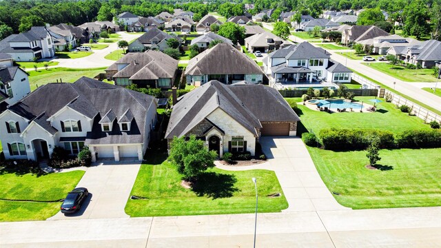 32811 Warbler Ct, Fulshear, TX 77441 - aerial view of residential area with a pool area