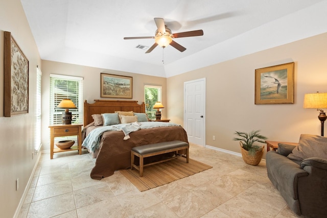 20103 Diamond Ct, Magnolia, TX 77355 - bedroom with baseboards, multiple windows, a tray ceiling, and ceiling fan