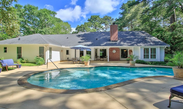20103 Diamond Ct, Magnolia, TX 77355 - swimming pool with a patio area