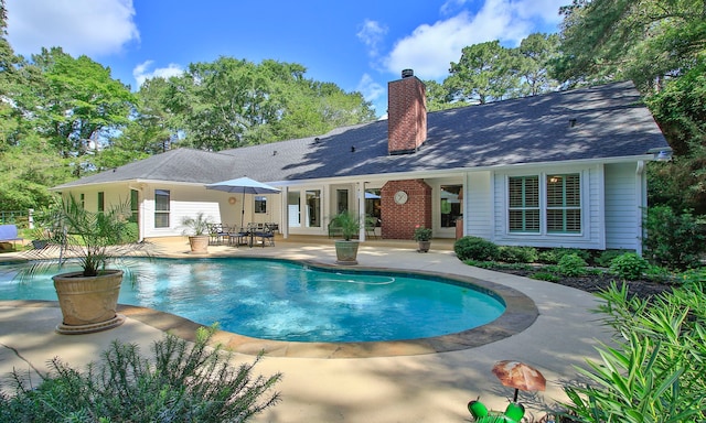 20103 Diamond Ct, Magnolia, TX 77355 - outdoor pool with a patio