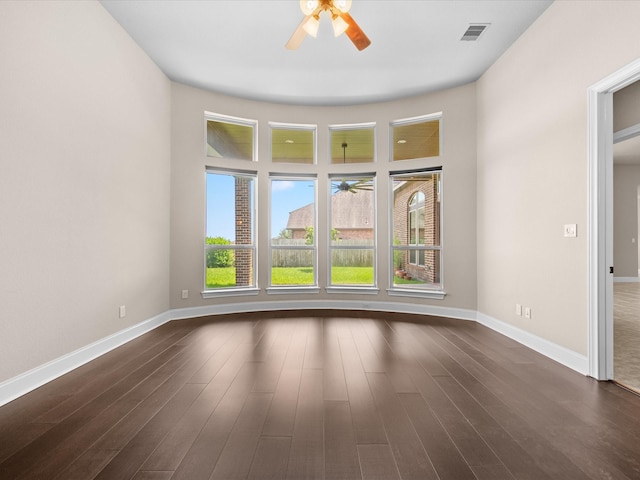 4410 Cobalt Cross St, Katy, TX 77493 - empty room featuring a ceiling fan, baseboards, and dark wood-style flooring