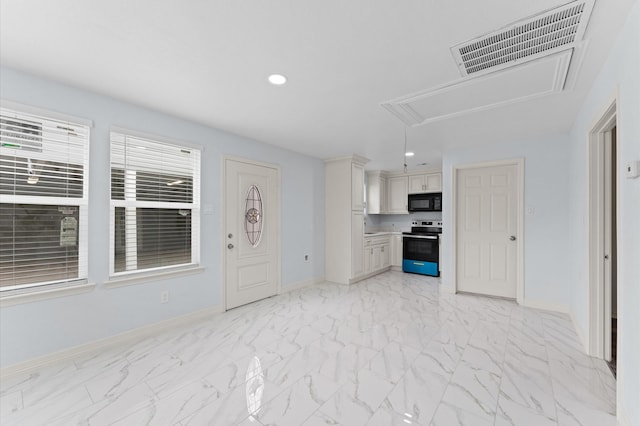 6105 Arthington St, Houston, TX 77053 - kitchen featuring black microwave, electric stove, baseboards, light marble finish floors, and recessed lighting