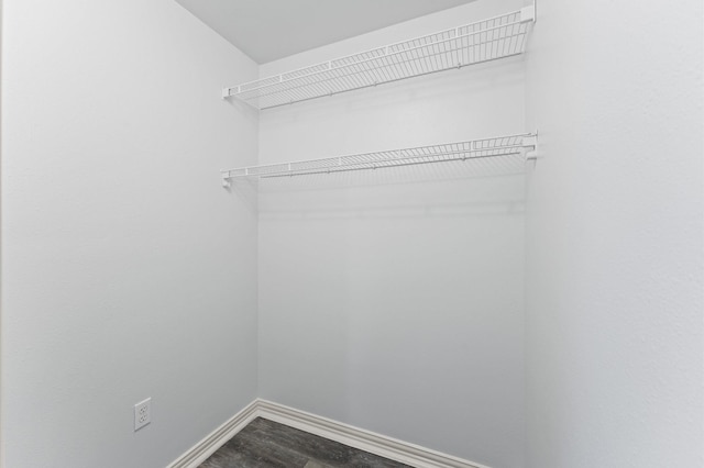 6105 Arthington St, Houston, TX 77053 - walk in closet featuring dark wood finished floors