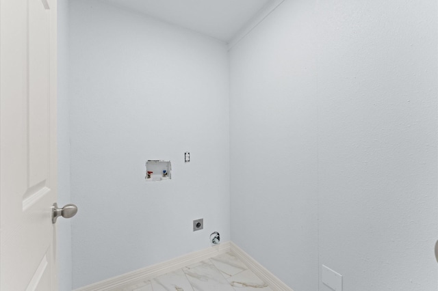 6105 Arthington St, Houston, TX 77053 - laundry room with electric dryer hookup, washer hookup, marble look tile flooring, and baseboards