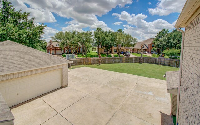 10711 Sea Myrtle Dr, Houston, TX 77095 - view of patio with a residential view