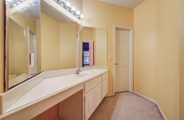 10711 Sea Myrtle Dr, Houston, TX 77095 - bathroom with vanity and baseboards