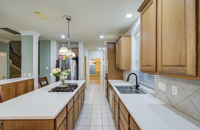 10711 Sea Myrtle Dr, Houston, TX 77095 - kitchen with a sink, stainless steel refrigerator with ice dispenser, backsplash, a kitchen island, and light countertops