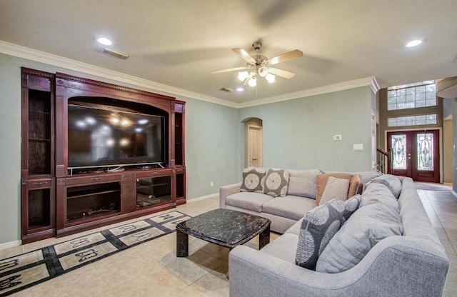 10711 Sea Myrtle Dr, Houston, TX 77095 - living room featuring arched walkways, ceiling fan, ornamental molding, recessed lighting, and light tile patterned flooring