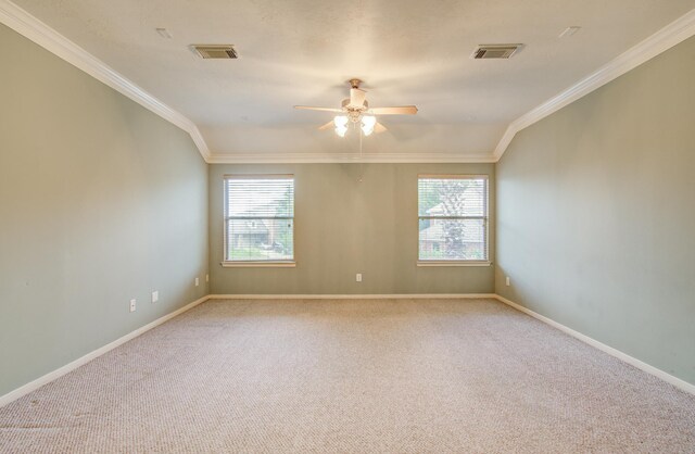 10711 Sea Myrtle Dr, Houston, TX 77095 - carpeted spare room featuring healthy amount of natural light, crown molding, a ceiling fan, and baseboards