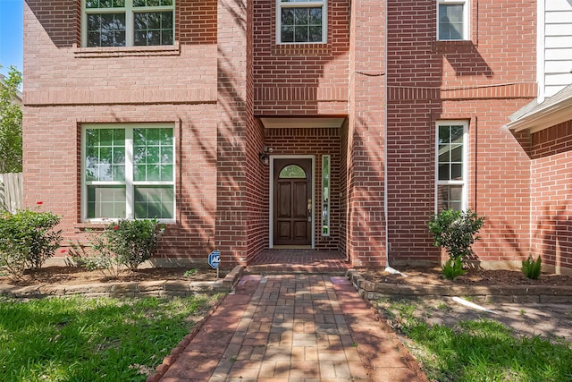 5714 Ames Xing, Sugar Land, TX 77479 - doorway to property featuring brick siding