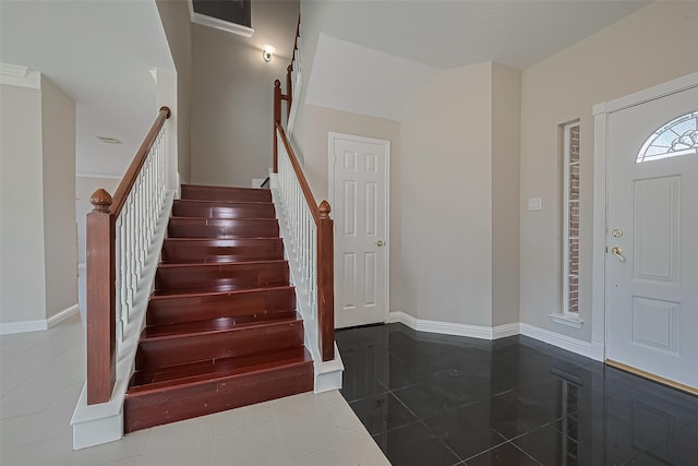 5714 Ames Xing, Sugar Land, TX 77479 - foyer entrance with stairs and baseboards