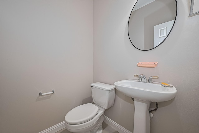 5714 Ames Xing, Sugar Land, TX 77479 - half bathroom featuring baseboards and toilet