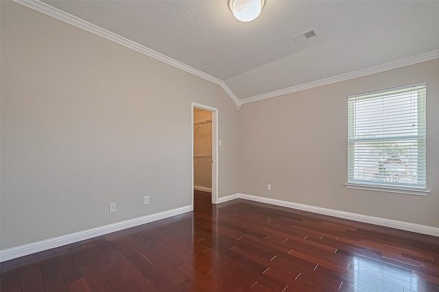 5714 Ames Xing, Sugar Land, TX 77479 - spare room featuring crown molding, dark wood-style floors, baseboards, and lofted ceiling