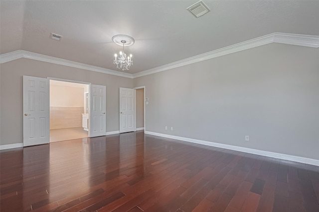 5714 Ames Xing, Sugar Land, TX 77479 - empty room with a chandelier, dark wood-style floors, vaulted ceiling, baseboards, and crown molding