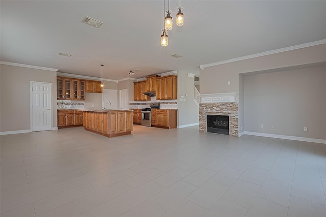 5714 Ames Xing, Sugar Land, TX 77479 - unfurnished living room featuring a sink, crown molding, baseboards, and a stone fireplace