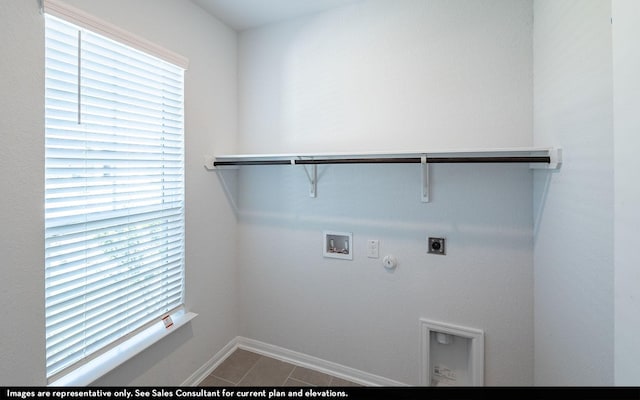 2443 Solaris Bend Dr, Katy, TX 77493 - laundry area with hookup for an electric dryer, gas dryer hookup, hookup for a washing machine, tile patterned flooring, and baseboards