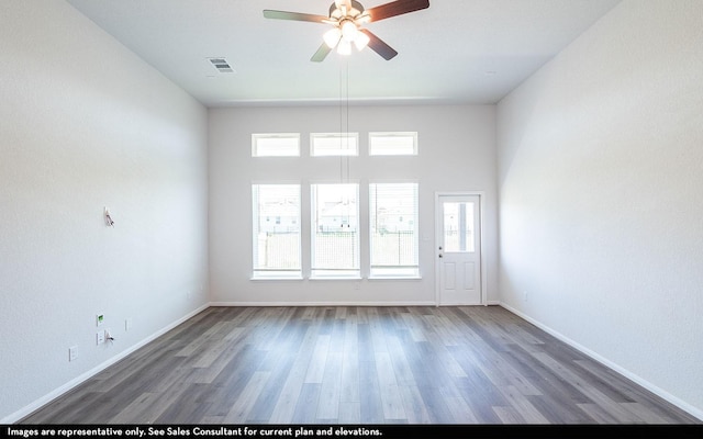 2443 Solaris Bend Dr, Katy, TX 77493 - unfurnished room featuring a ceiling fan, wood finished floors, and baseboards