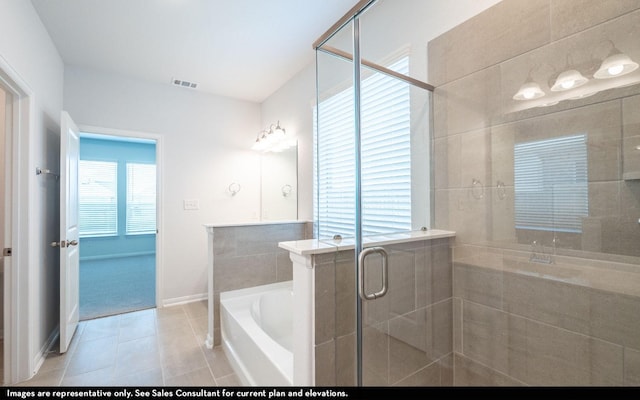 2443 Solaris Bend Dr, Katy, TX 77493 - bathroom with a bath, a shower stall, tile patterned floors, and baseboards