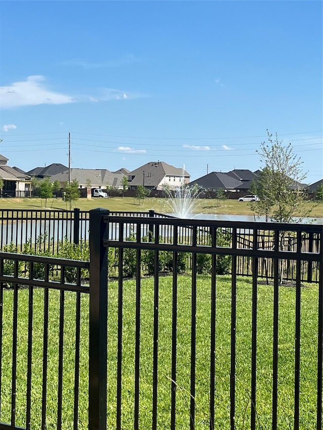 2443 Solaris Bend Dr, Katy, TX 77493 - view of yard with a residential view and a water view