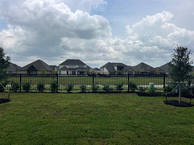 2443 Solaris Bend Dr, Katy, TX 77493 - view of yard featuring a residential view