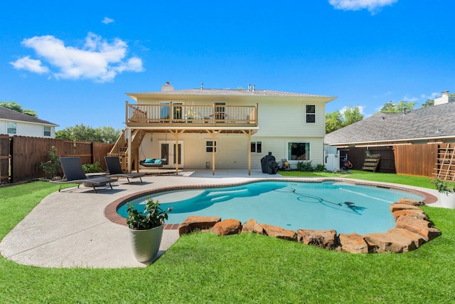 32123 Willow Creek Park, Conroe, TX 77385 - back of house featuring a patio, a chimney, stairway, and a deck