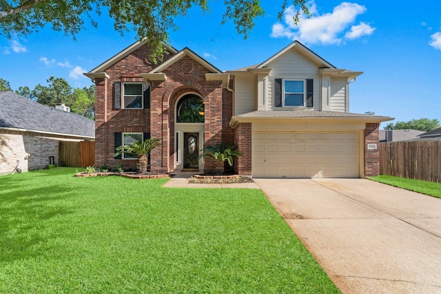 32123 Willow Creek Park, Conroe, TX 77385 - traditional-style home with brick siding, a garage, and driveway