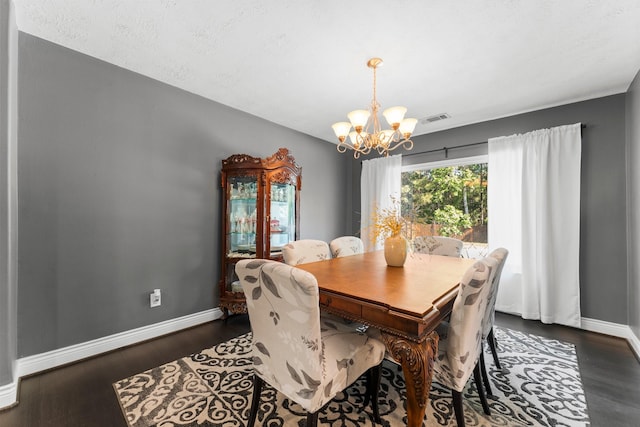32123 Willow Creek Park, Conroe, TX 77385 - dining room with a chandelier, baseboards, and dark wood-type flooring