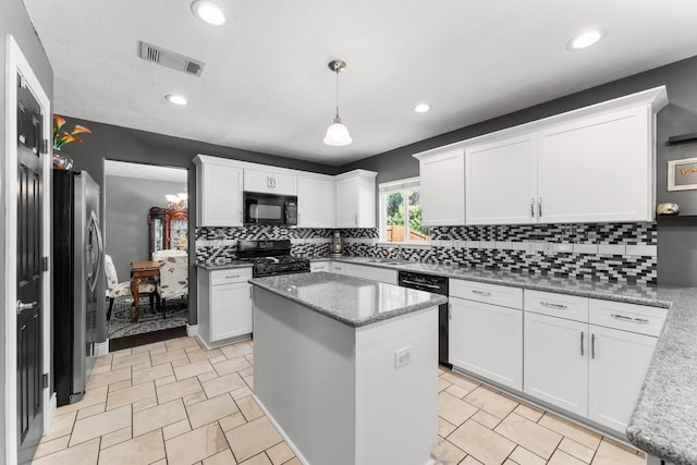 32123 Willow Creek Park, Conroe, TX 77385 - kitchen featuring black appliances, white cabinetry, backsplash, a center island, and recessed lighting