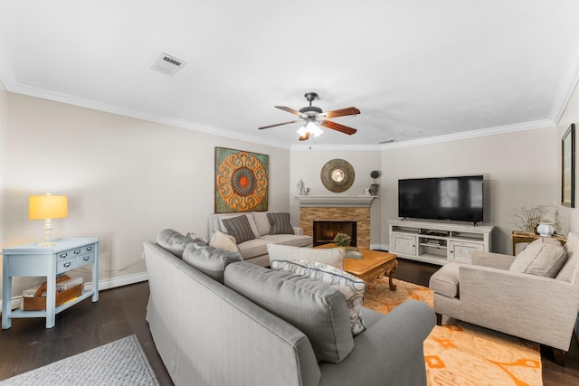 32123 Willow Creek Park, Conroe, TX 77385 - living area with crown molding, dark wood-type flooring, ceiling fan, a fireplace, and baseboards