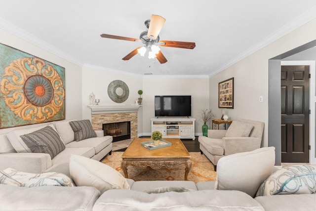 32123 Willow Creek Park, Conroe, TX 77385 - living area with ornamental molding, ceiling fan, a fireplace, baseboards, and light wood finished floors