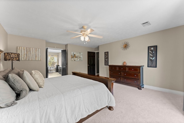 32123 Willow Creek Park, Conroe, TX 77385 - bedroom featuring light colored carpet, baseboards, and a ceiling fan