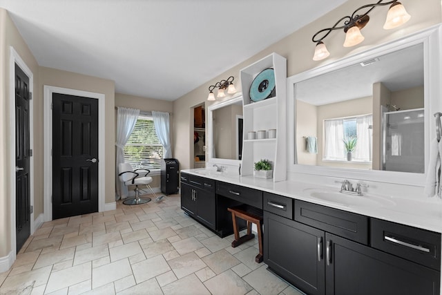32123 Willow Creek Park, Conroe, TX 77385 - bathroom featuring a shower stall, double vanity, and baseboards