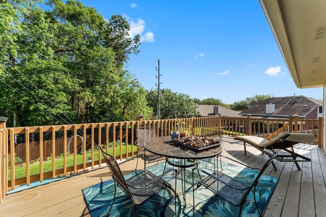 32123 Willow Creek Park, Conroe, TX 77385 - wooden terrace featuring outdoor dining area and fence