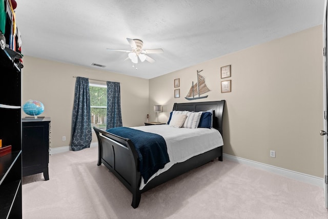 32123 Willow Creek Park, Conroe, TX 77385 - bedroom featuring light colored carpet, baseboards, and a ceiling fan